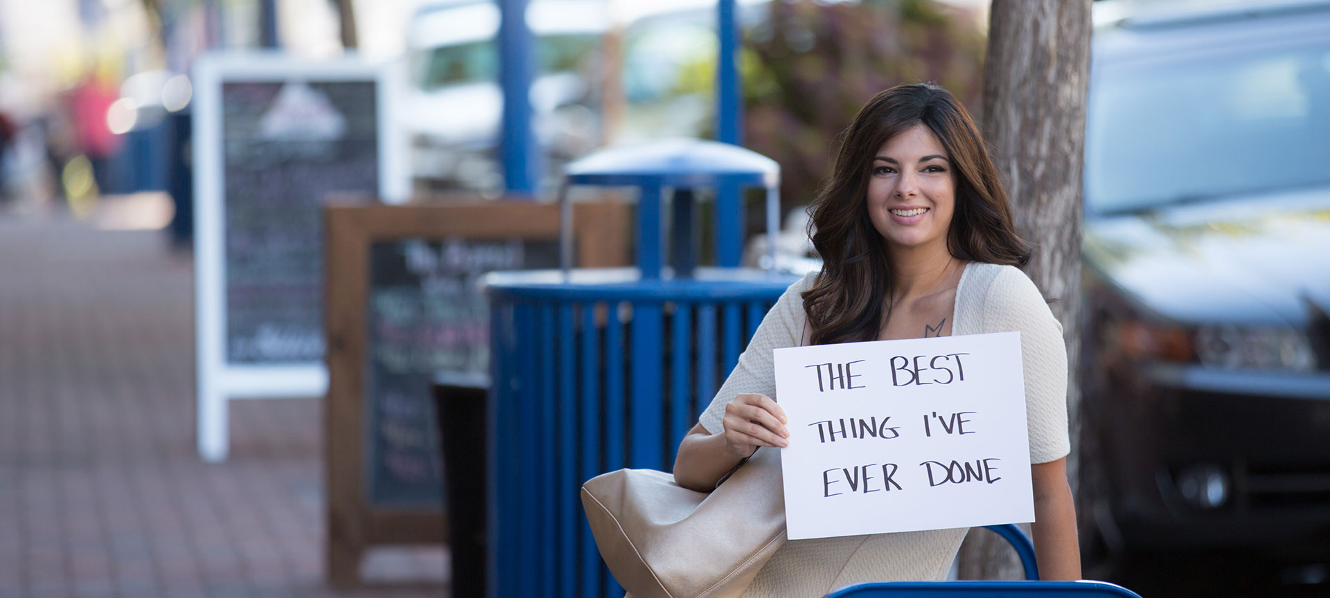 Woman Holding Sign